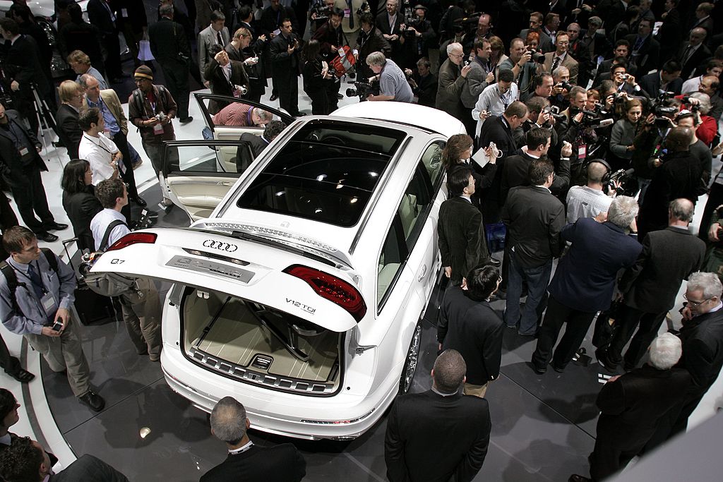 DETROIT - JANUARY 7:  The new Audi Q7 V12 TDI Concept vehicle draws heavy attention from the media following its introduction at the 2007 North American International Auto Show January 7, 2007 in Detroit, Michigan. The show draws nearly 7,000 members of the news media from around the world and opens to the public January 13.  (Photo by Bill Pugliano/Getty Images)