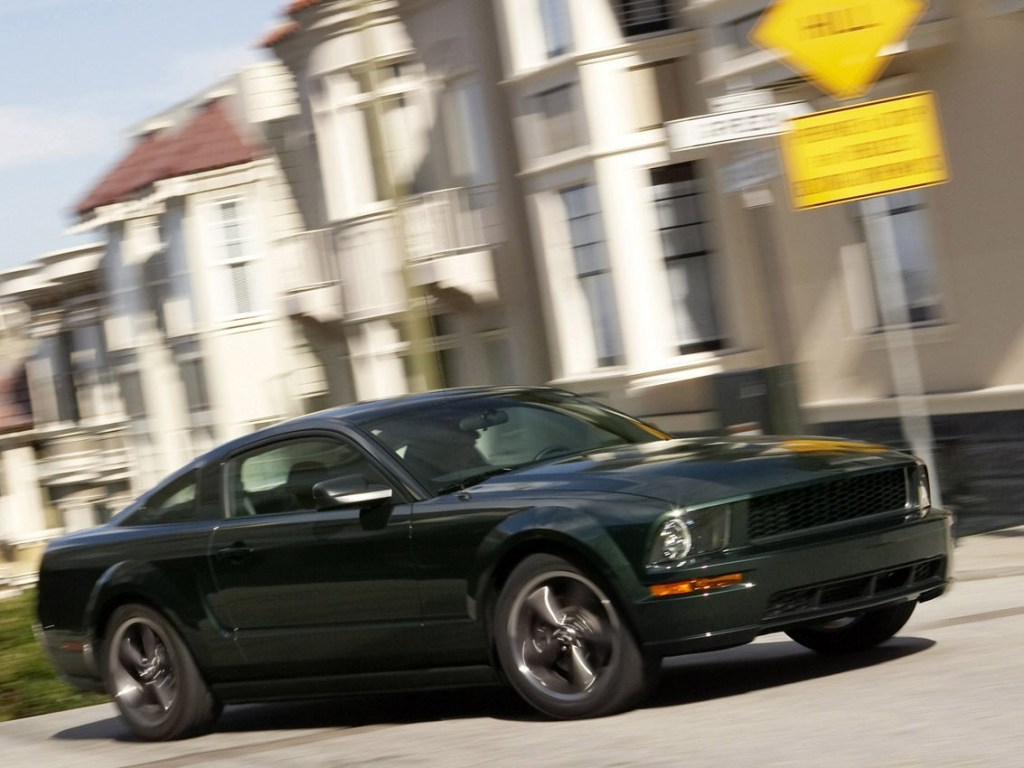 A dark green Ford Mustang prowls the streets of California