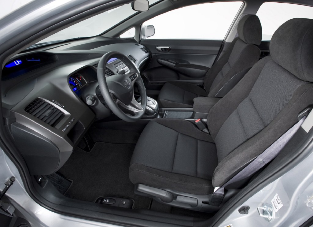 The 2009 Honda Civic's black front seats and dashboard