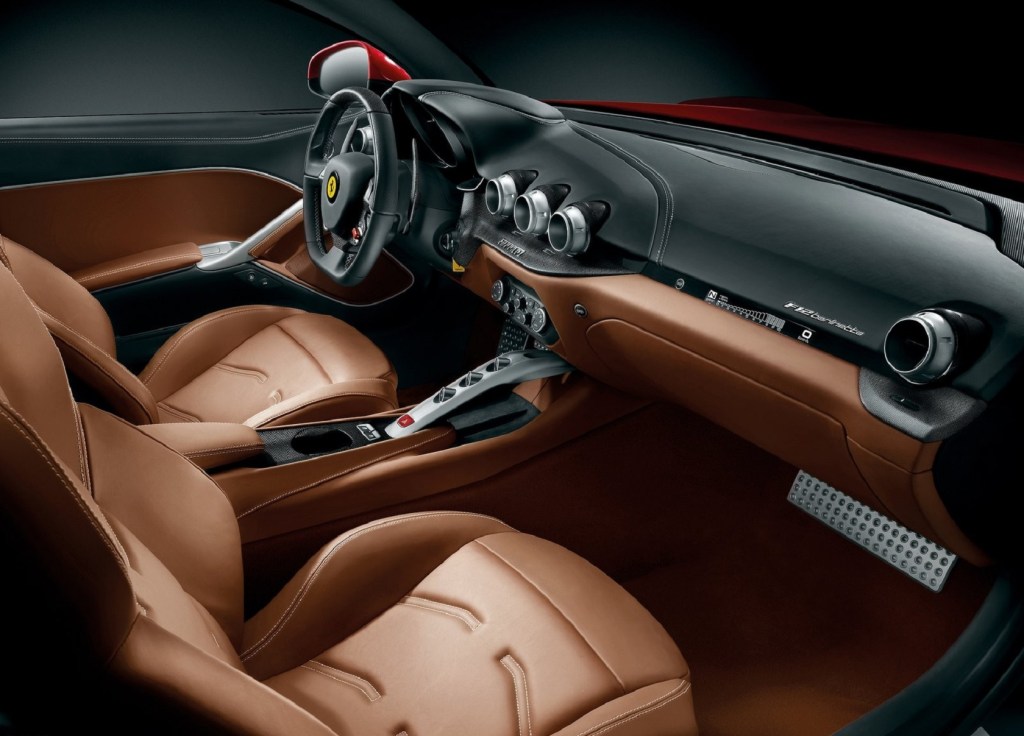 The tan-leather-upholstered interior of a 2013 Ferrari F12 Berlinetta