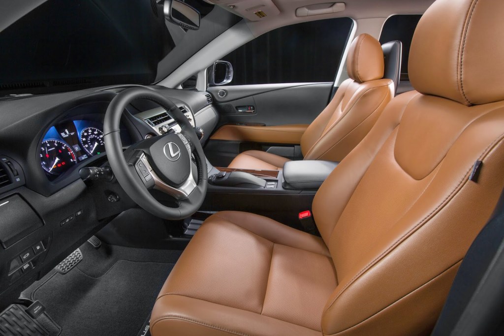 A 2015 Lexus RX with brown leather seats.