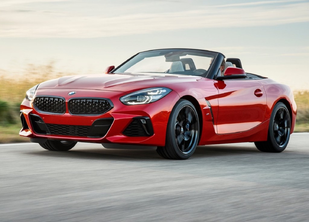 A red 2019 BMW Z4 M40i First Edition with its roof down