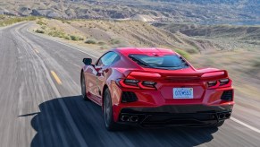 Chevy Corvette at speed on a remote two lane highway