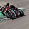 The 2020 Ducati Streetfighter V4 S takes a corner on a racetrack