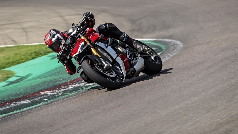 The 2020 Ducati Streetfighter V4 S takes a corner on a racetrack