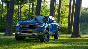 2020 Ford Ranger driving in the forest with lush green grass