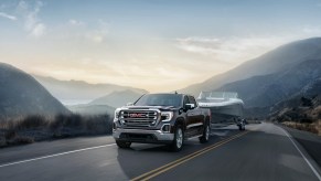 2020 GMC Sierra SLT towing a boat