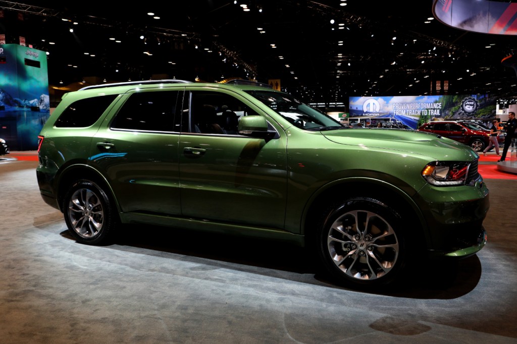 A green 2020 Dodge Durango on display at an auto show