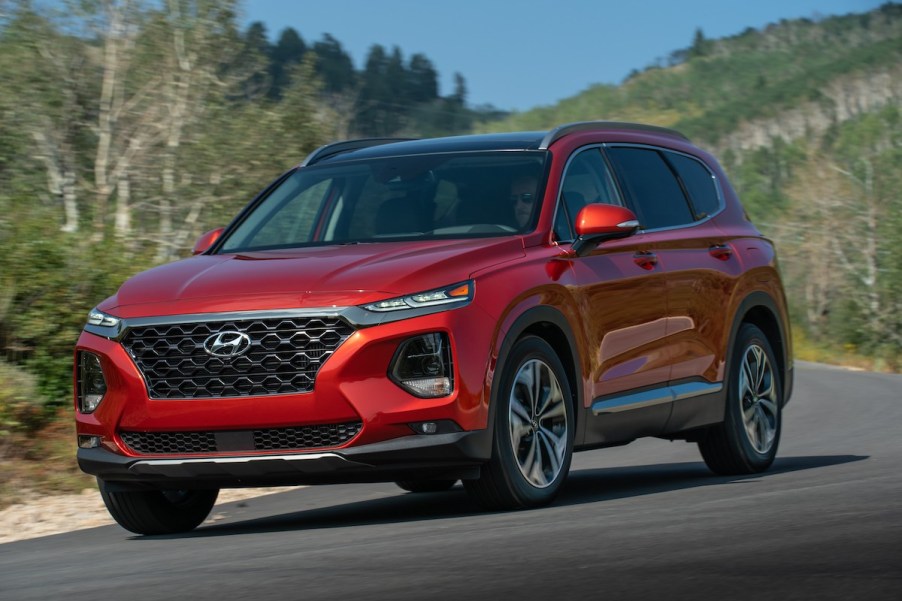 2020 Hyundai Santa Fe in the road with trees