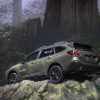2020 Subaru Outback displaying capability with staged photo on top of a cliffside