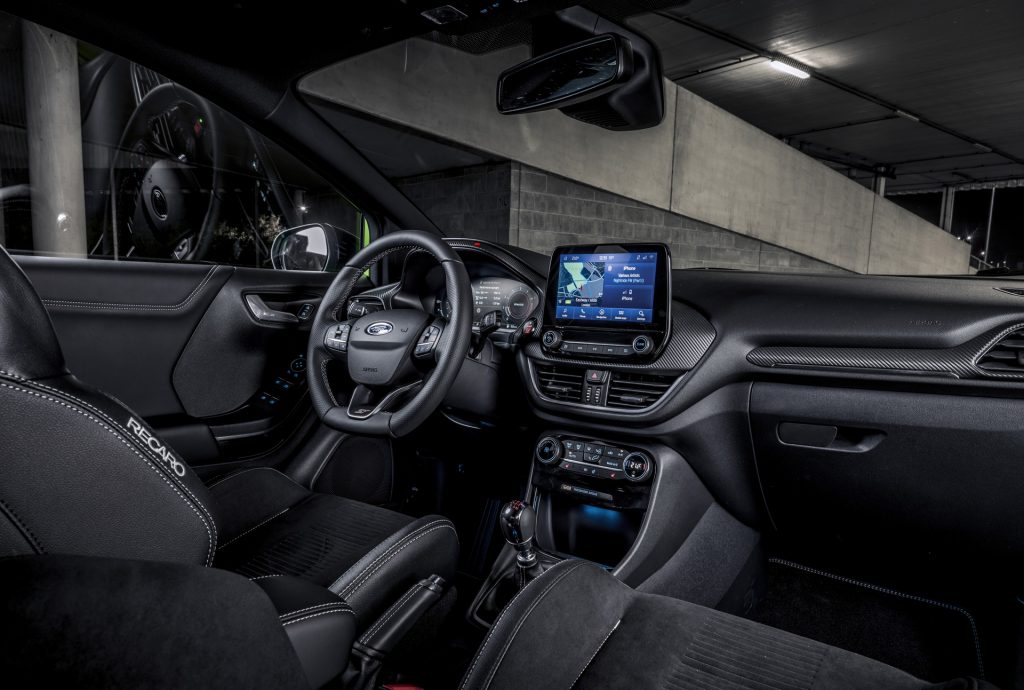 The black Recaro front seats and black dashboard of the 2021 Ford Puma ST