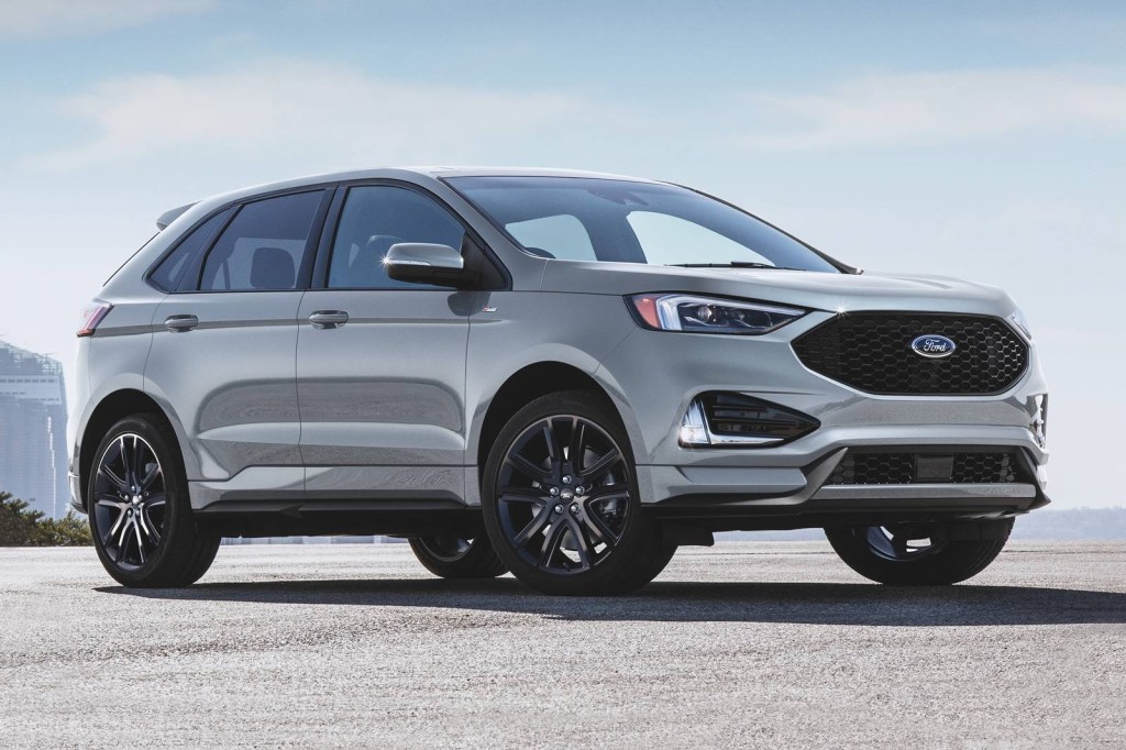 A grey 2020 Ford Edge on the track.