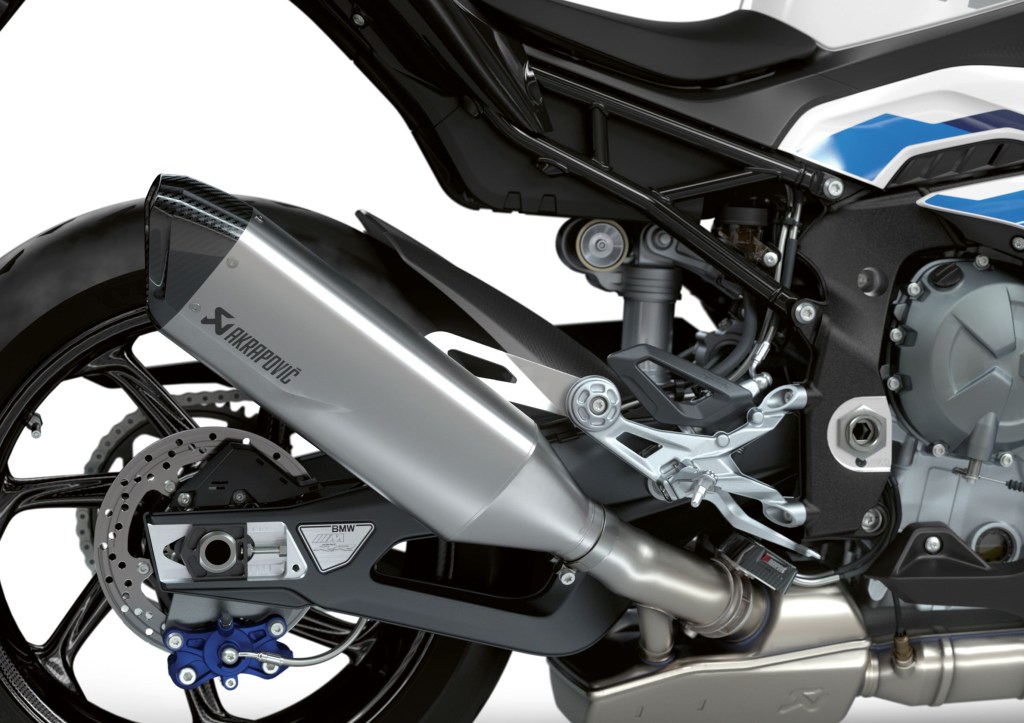 The 2021 BMW M 1000 RR's titanium Akrapovic exhaust and rear of its frame and engine
