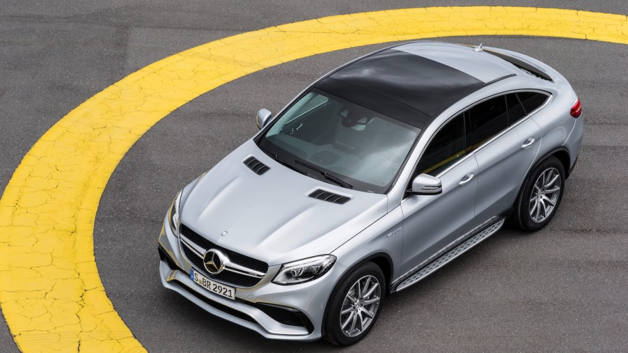 2021 Mercedes-AMG GLE 63 parked near a yellow curved line