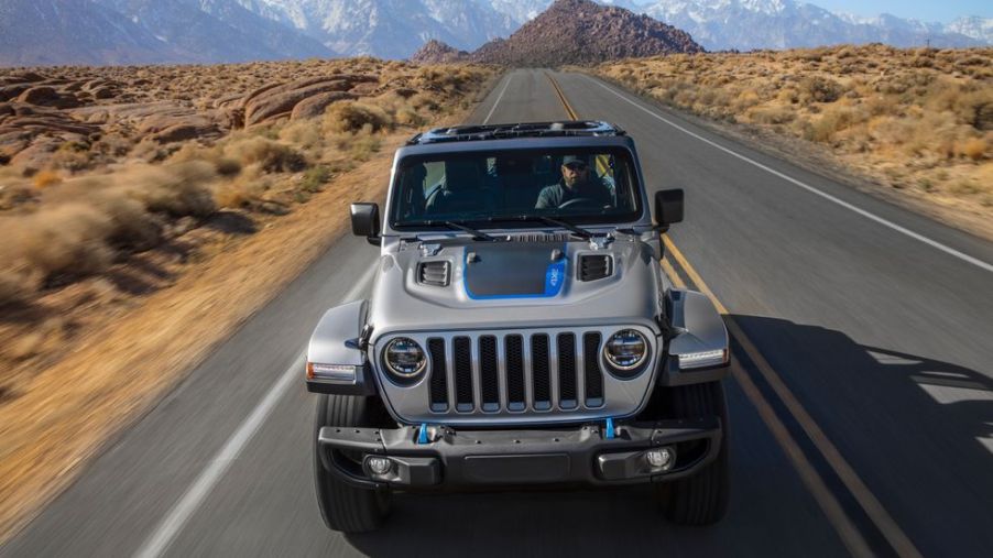 2021 Jeep Wrangler 4xe driving down the road