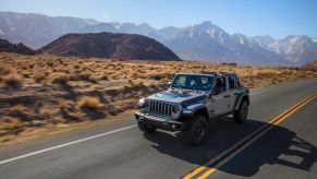 2021 Jeep Wrangler 4xe driving on wilderness road