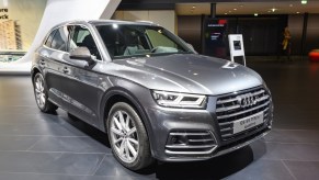 An Audi Q5 plug-in hybrid on display at an auto show