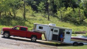 The boat and camper RV trailer at the boat launch.