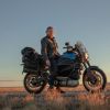 Ewan McGregor on his blue Harley-Davidson LiveWire modified for Long Way Up