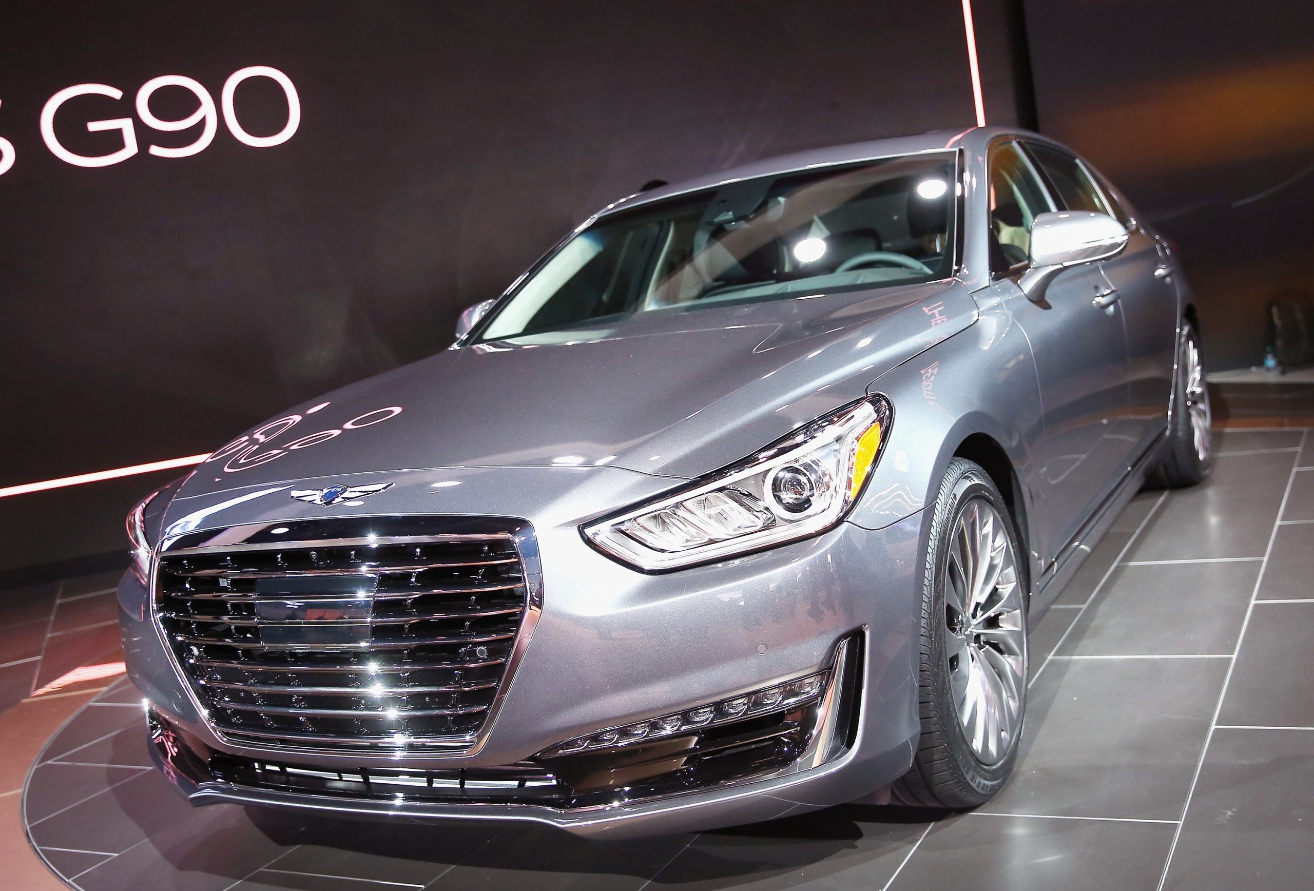 A Genesis G90 on display at an auto show