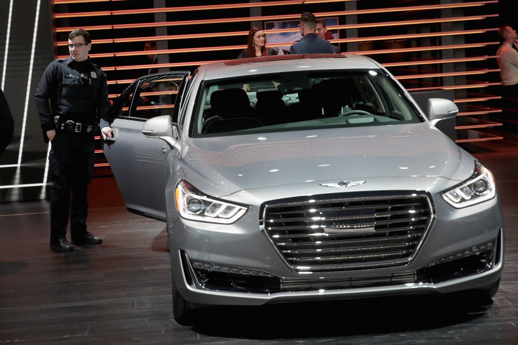 A Genesis G90 on display at an auto show
