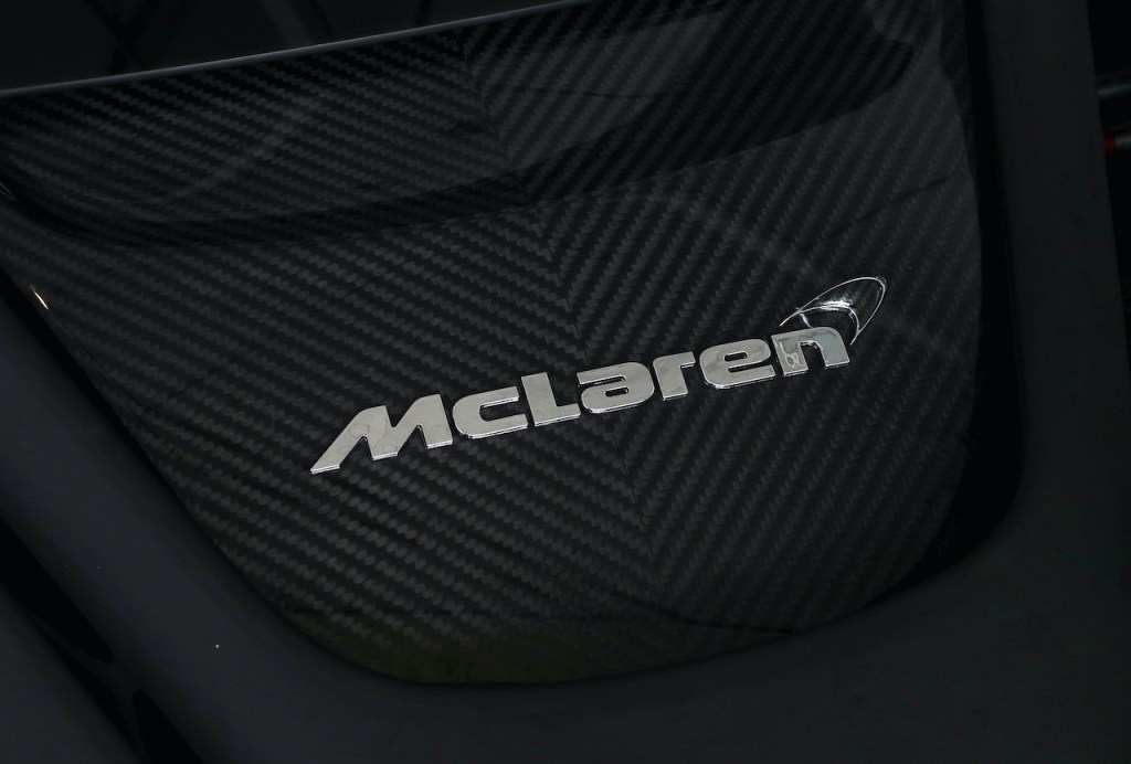 A carbon fiber panel with the McLaren emblem