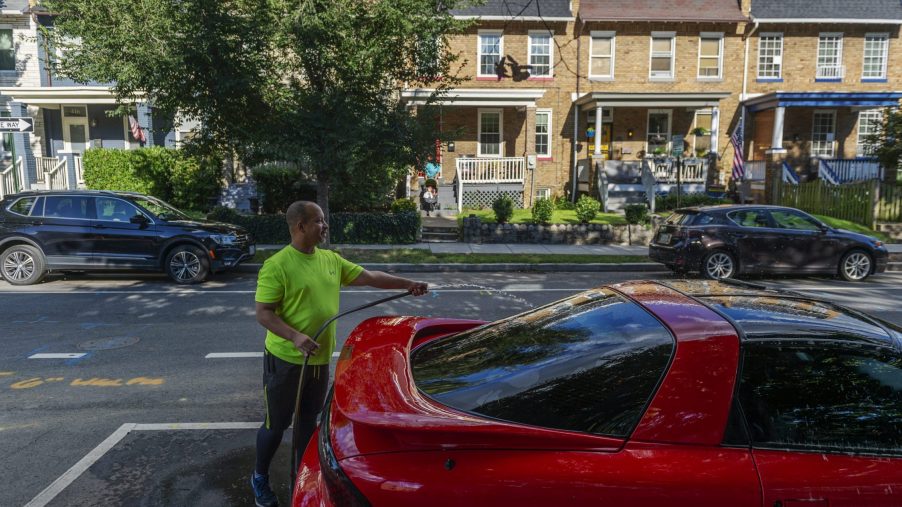 John Branscomb washes his car in the Barney Circle neighborhood in Washington, DC, on August 30, 2020.