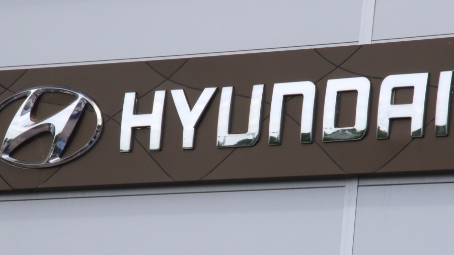 Hyundai motor company logo seen at a car dealership