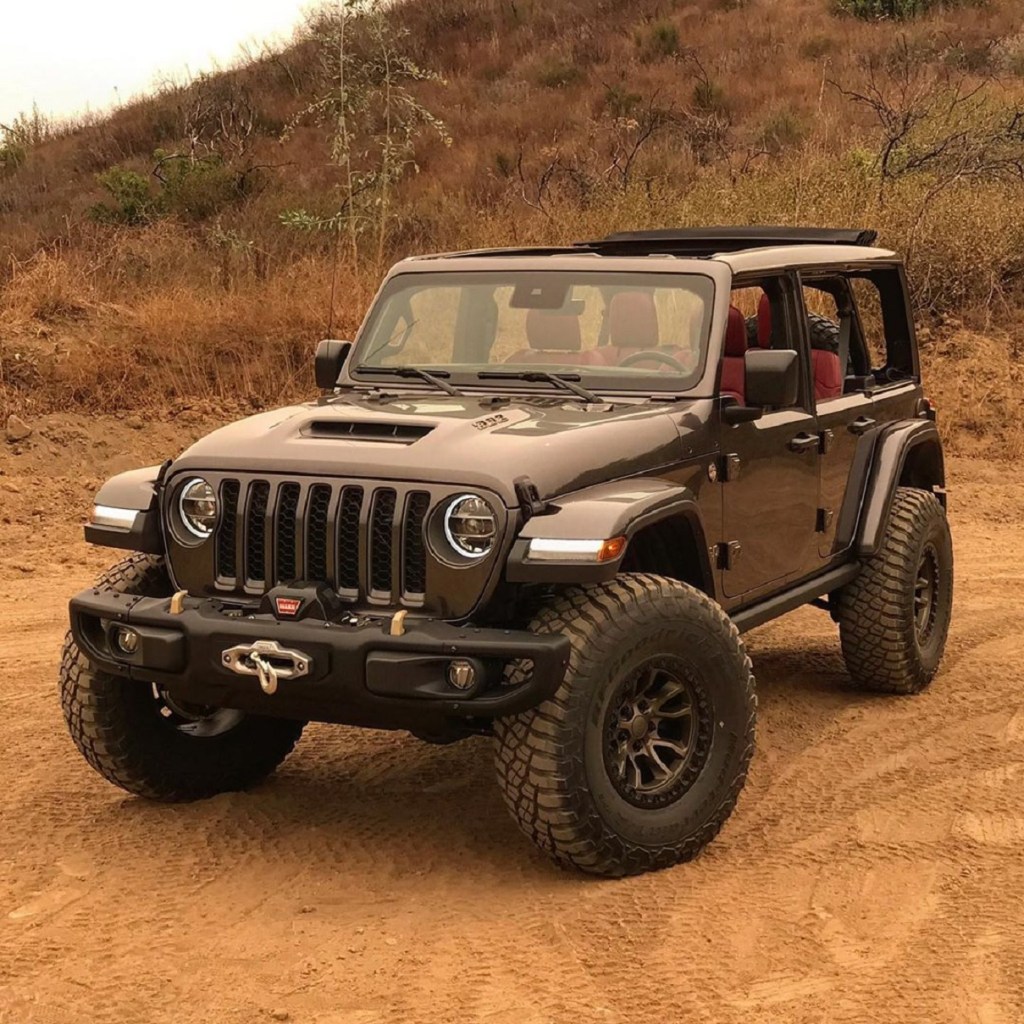 The black Jeep Wrangler 392 Concept in the desert. Even though Consumer Reports hates them, the customers love them.  