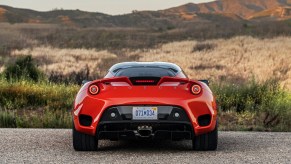 Lotus Evora GT red in the middle of the desert