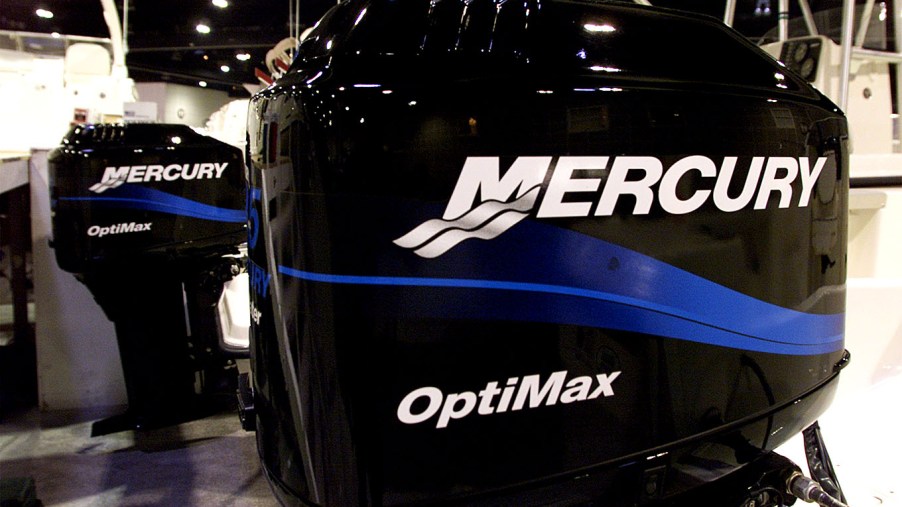 Mercury outboard motors on display at a boat show