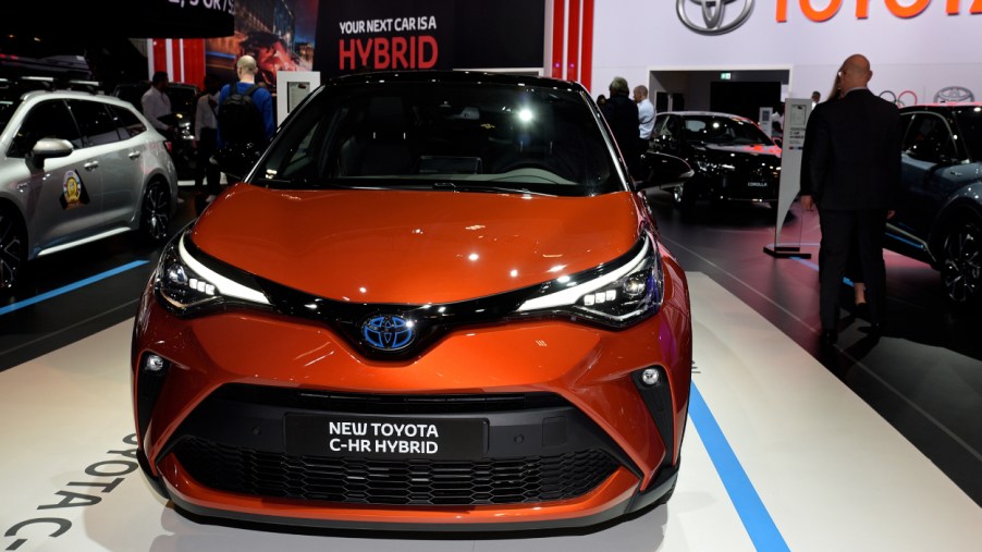 A Toyota C-CHR Hybrid on display at an auto show