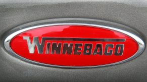 A Winnebago logo decorates the front of a Sightseer motor home