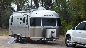 airstream trailer parked with a truck