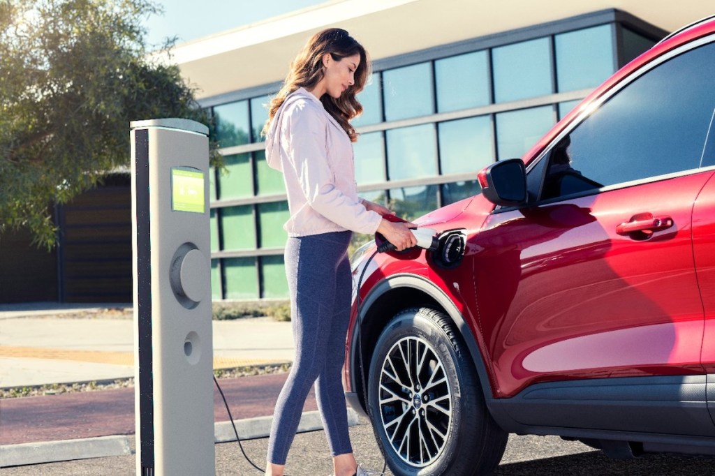 Ford Escape Plug-In Hybrid charging at a charge station