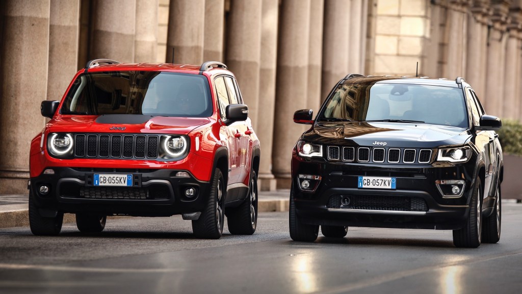 Jeep Renegade 4xe and Jeep Compass 4xe parked on street