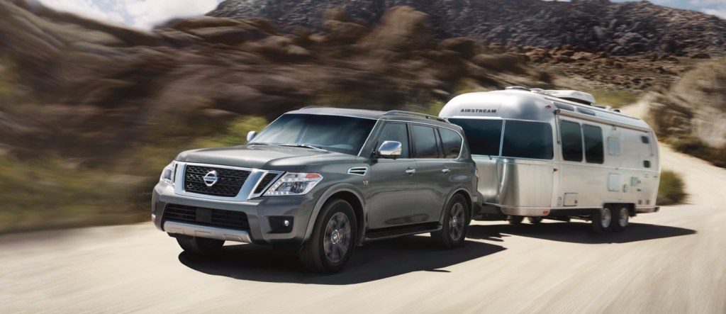 A 2020 gray Nissan Armada towing a trailer. 