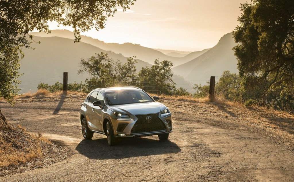 the lexus NX driving in the country