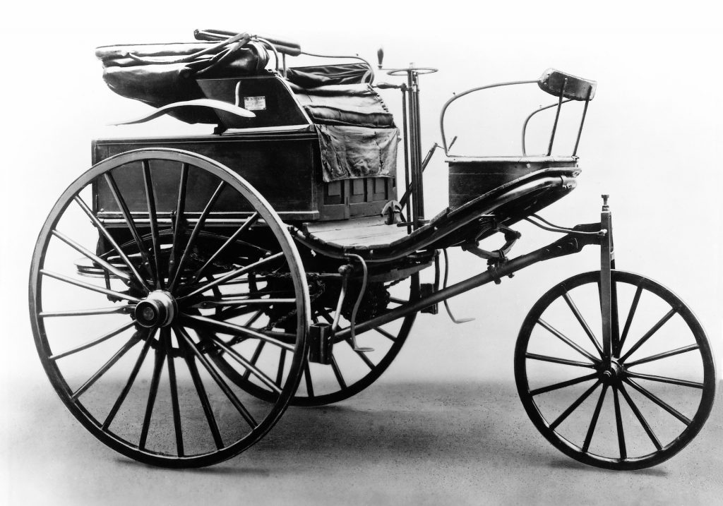 A photo of a vintage Benz & Co. ad depicting the Patent-Motorwagen.