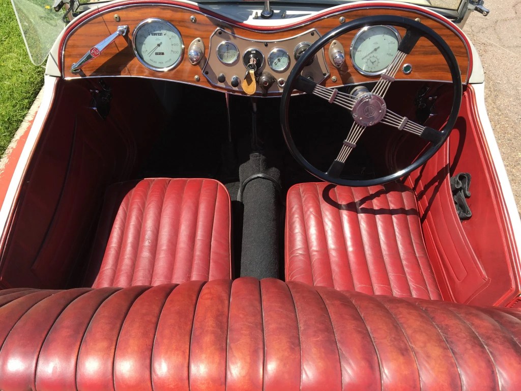The red-leather interior of a 1949 MG TC EXU