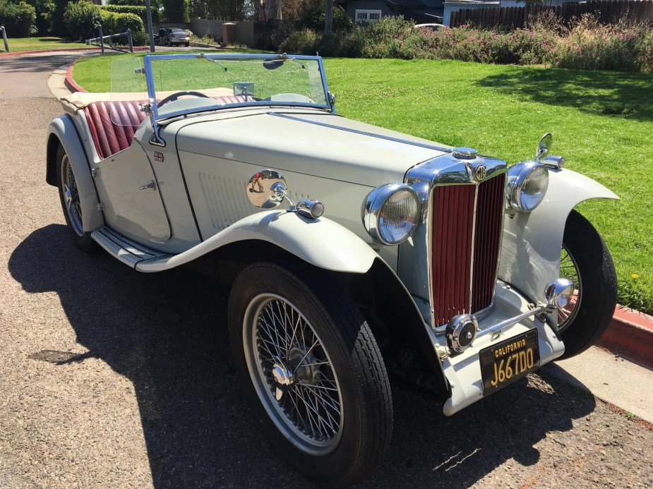 A gray 1949 MG TC EXU parked on the street