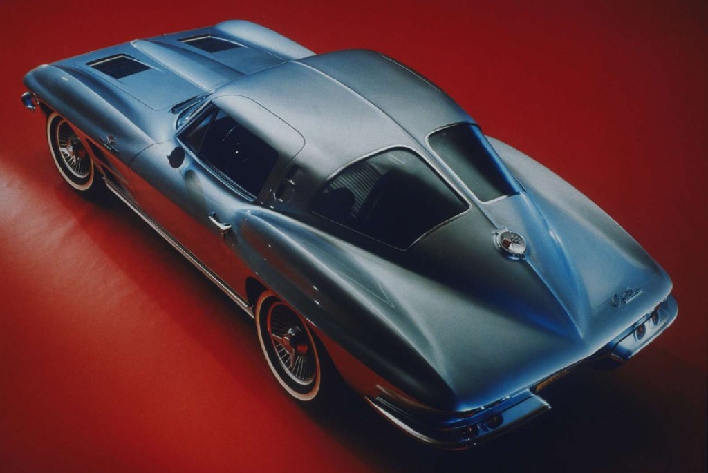 The overhead 3/4 view of a blue 1963 Chevrolet Corvette Sting Ray coupe