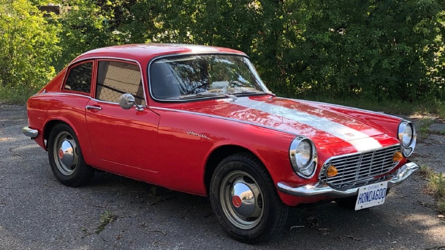 A red 1966 Honda S600 coupe