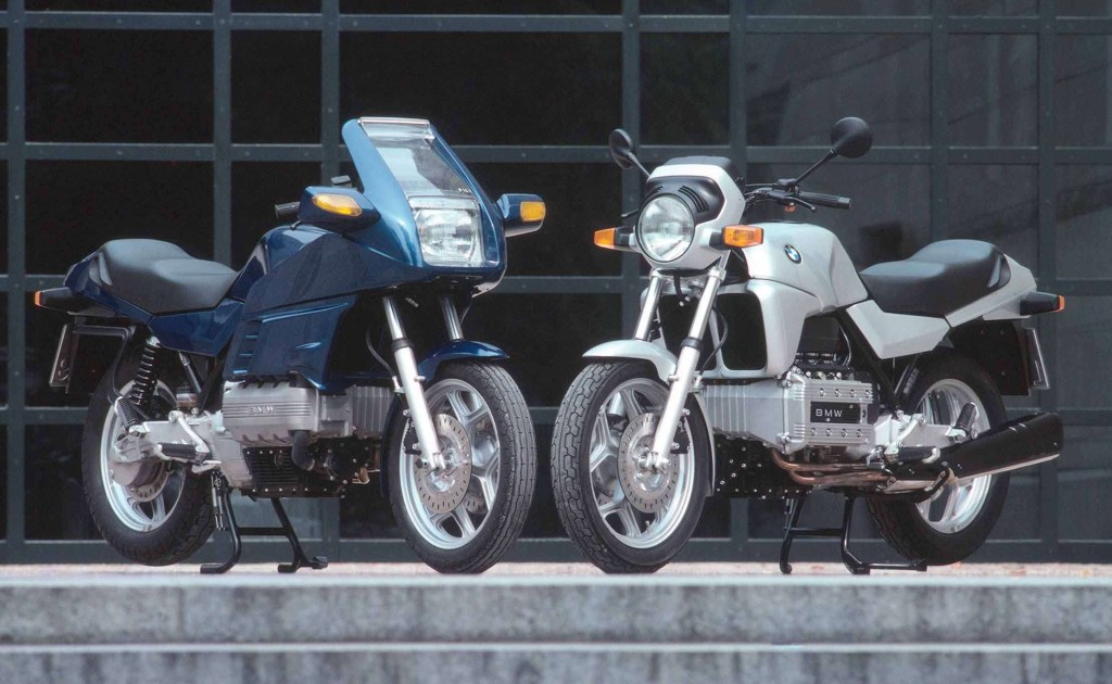 A blue 1983 BMW K100RS next to a silver 1983 BMW K100