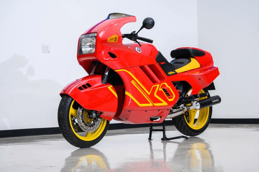A red-and-yellow 1990 BMW K1