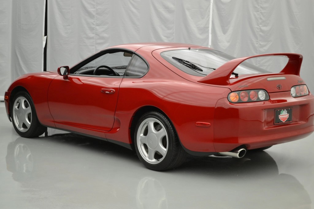 The rear view of a red 1994 Toyota Supra Turbo