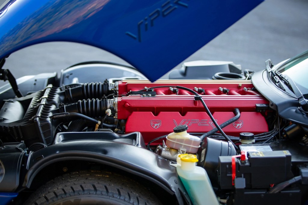 A close-up of the 1996 Dodge Viper GTS' V10 red-covered engine