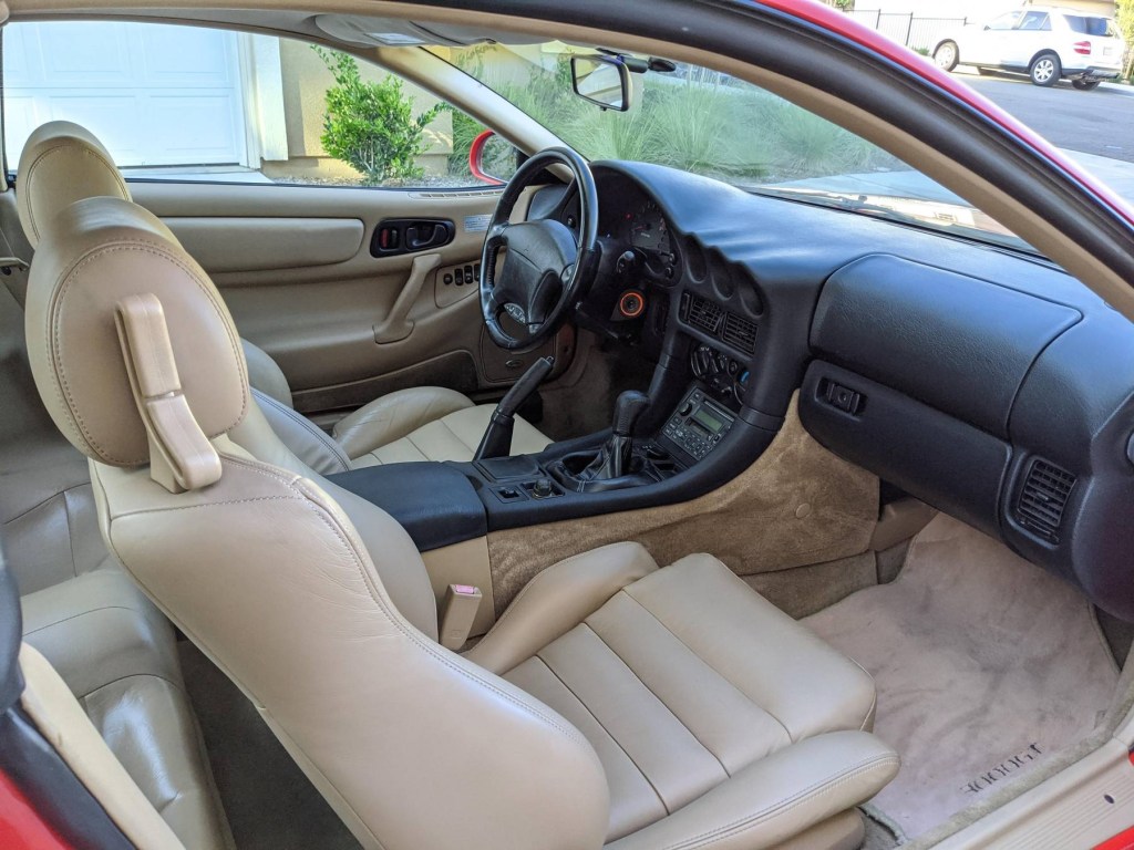 The 1997 Mitsubishi 3000GT SL's tan-leather interior