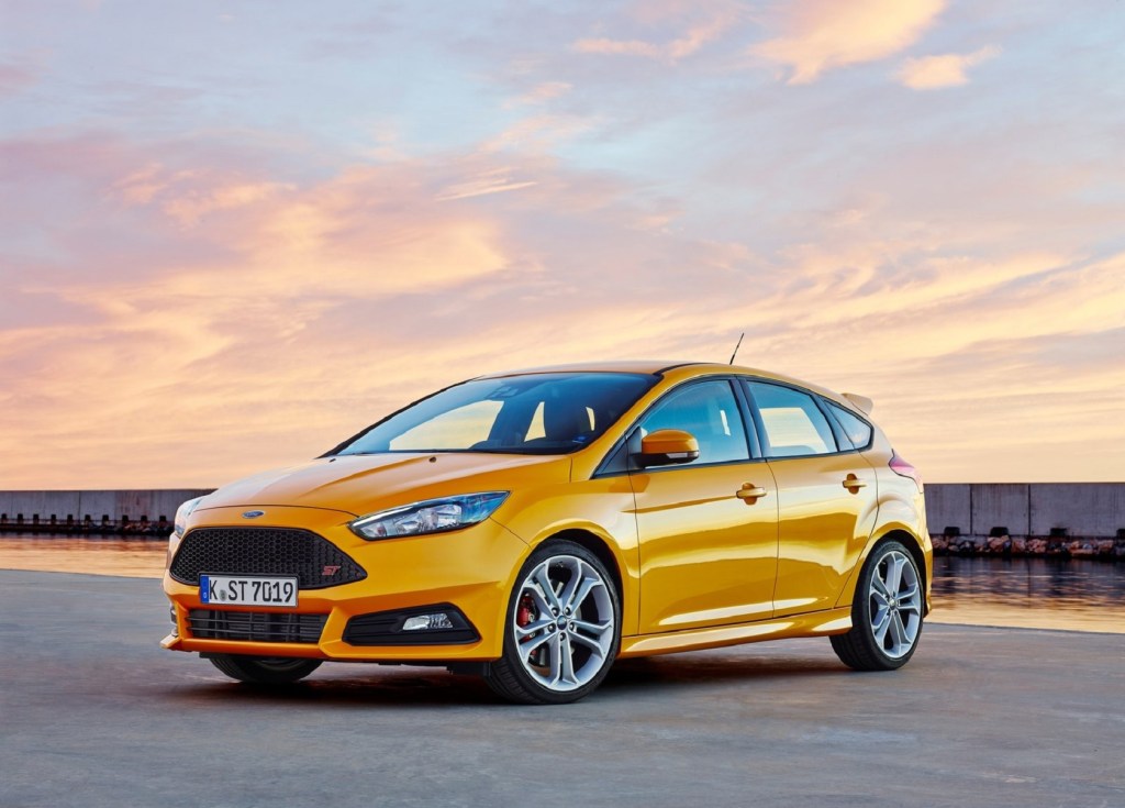 A yellow 2015 Ford Focus ST