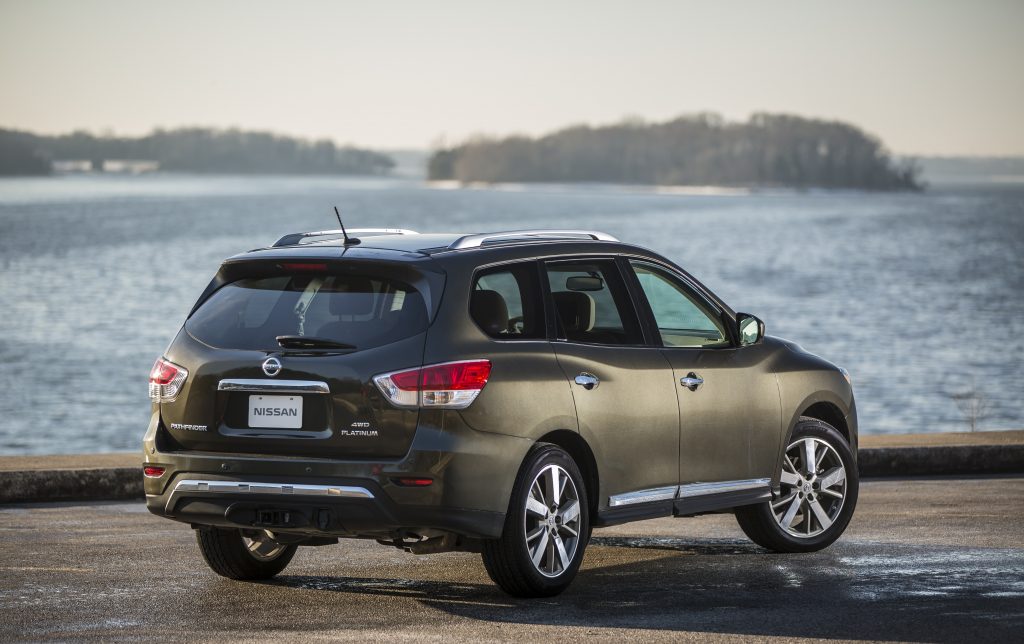 The 2016 Nissan Pathfinder, parked and looking out toward the water.